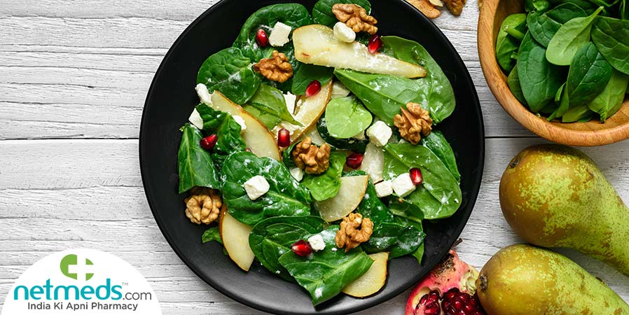 Pomegranate and pear green salad