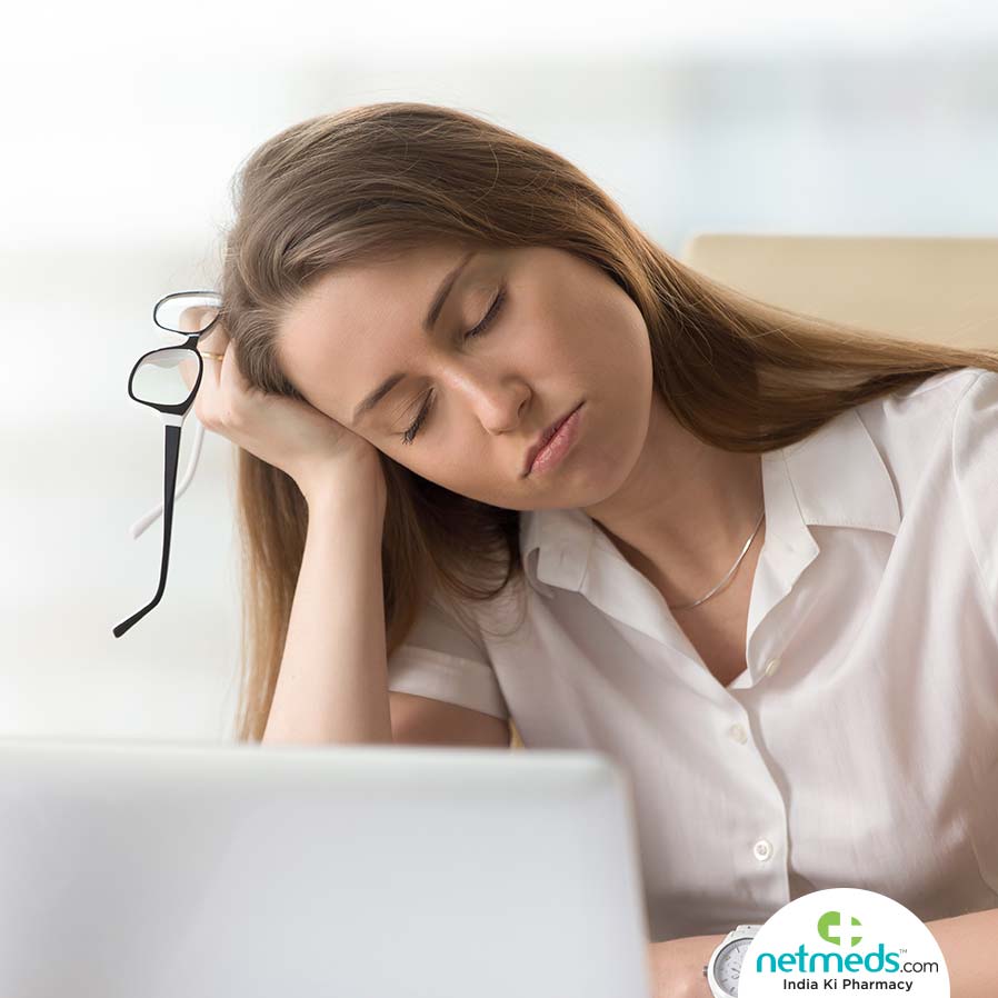 Woman With Mood Disorder sitting and sleeping in work