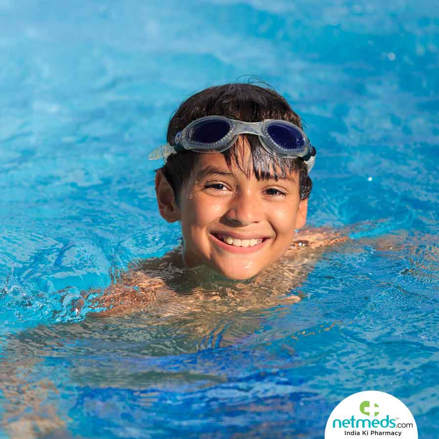 A boy swimming in the pool