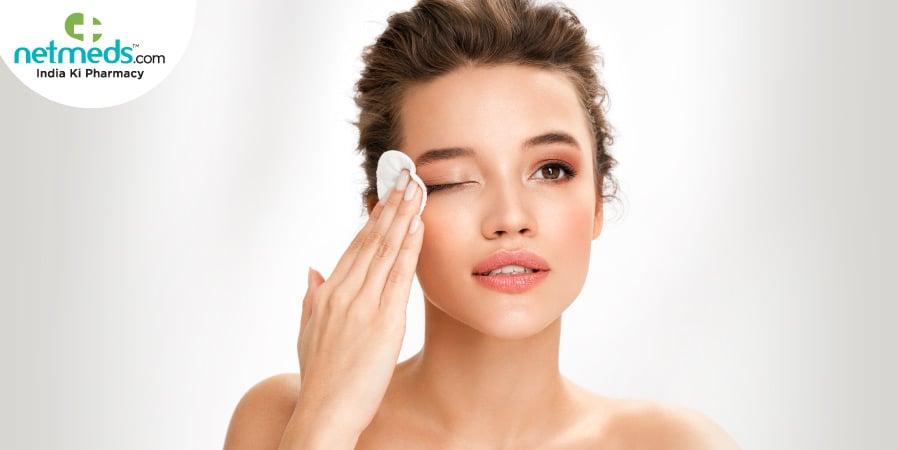 Woman removing makeup