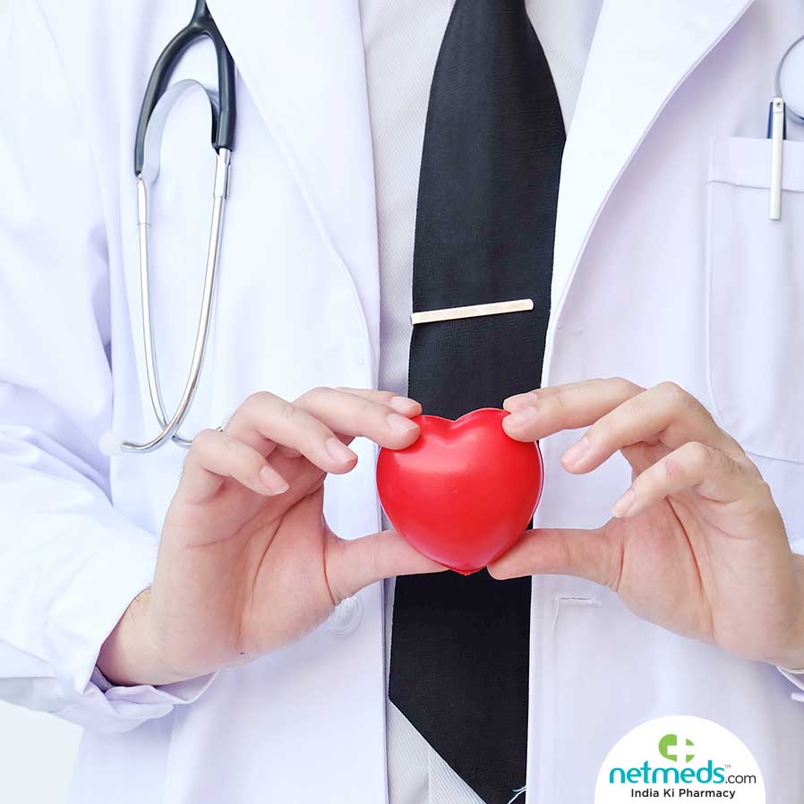 doctor holding a plastic heart shape