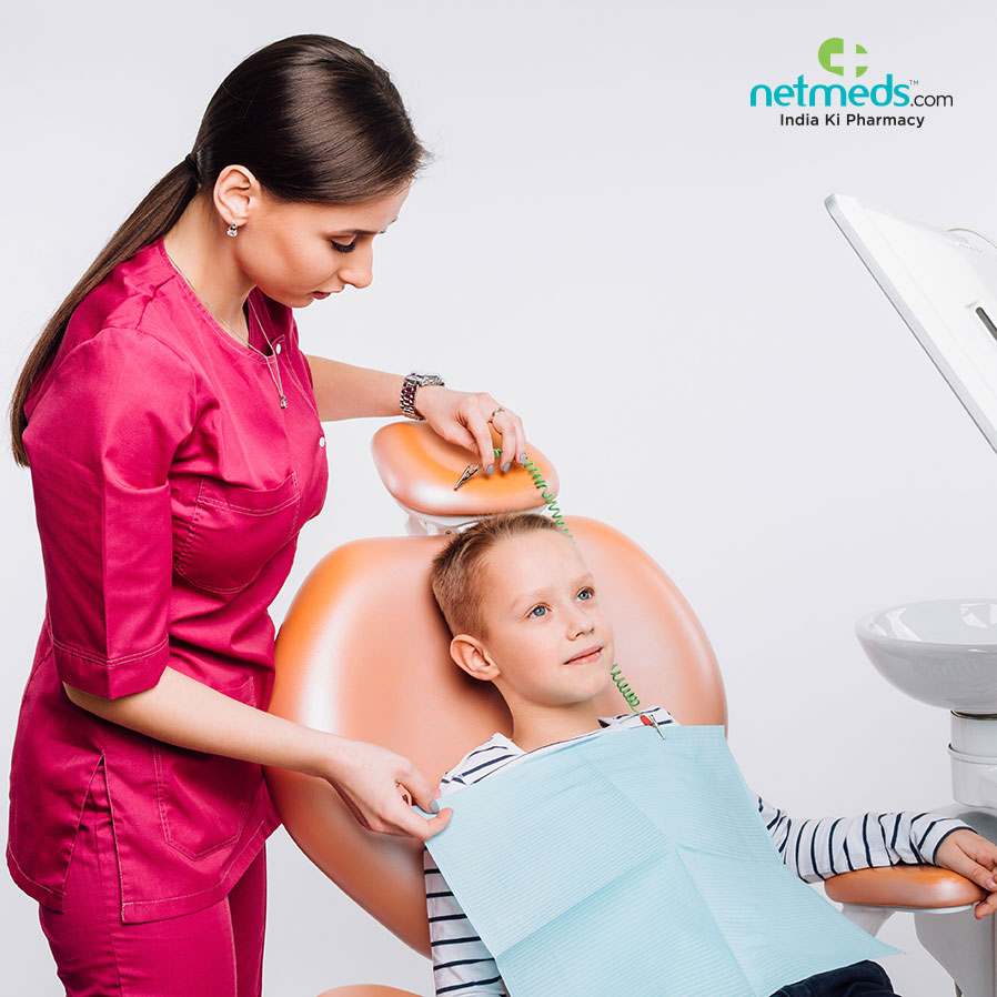 Dentist Treating A Kid