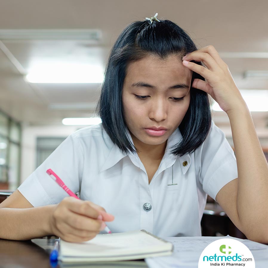 A girl writing exam