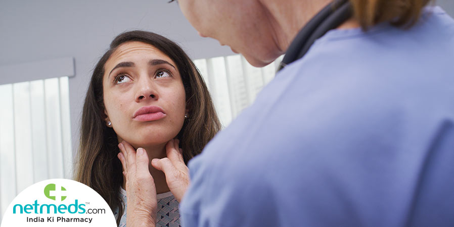 doctor checking the lymph nodes of a patient