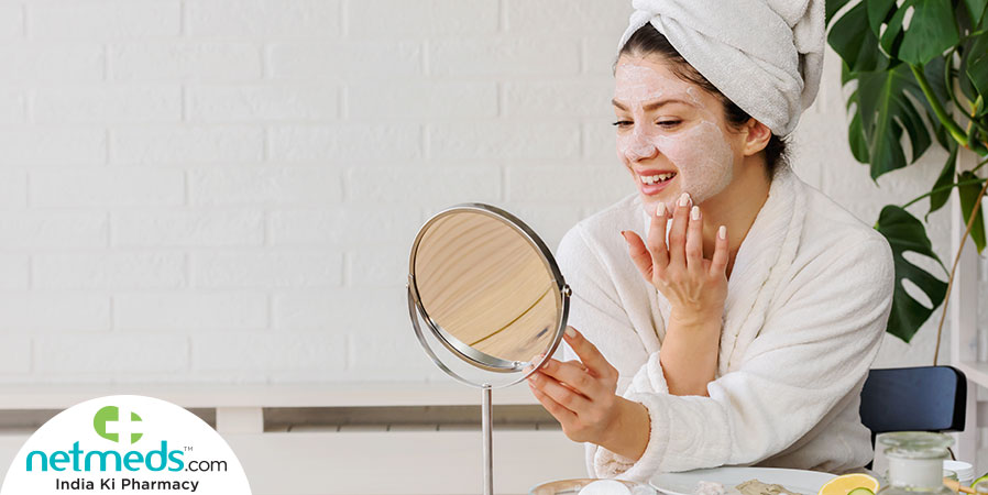Woman applying scrub while seeing the mirror