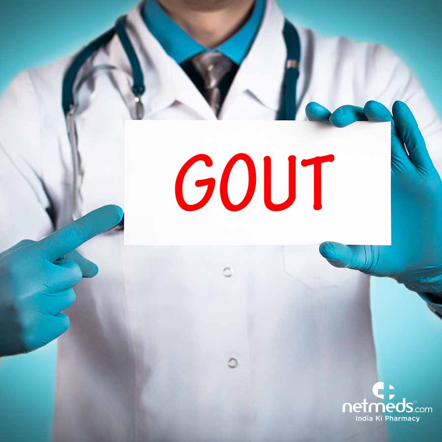 Doctor pointing out a gout card
