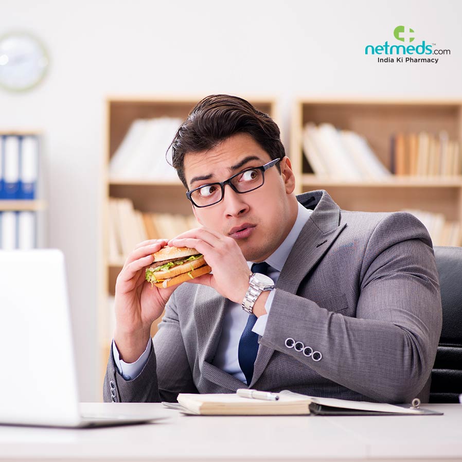 Man eating burger