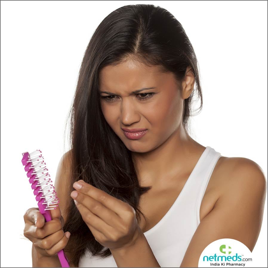Woman having hair fall problem