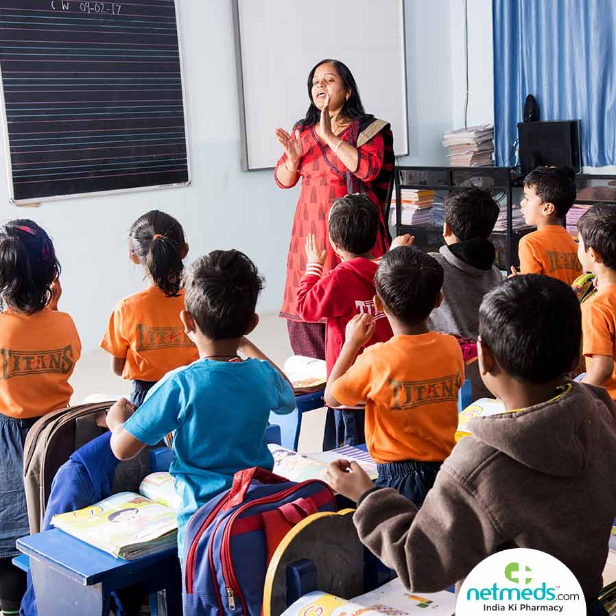 A Teacher Teaching The Children