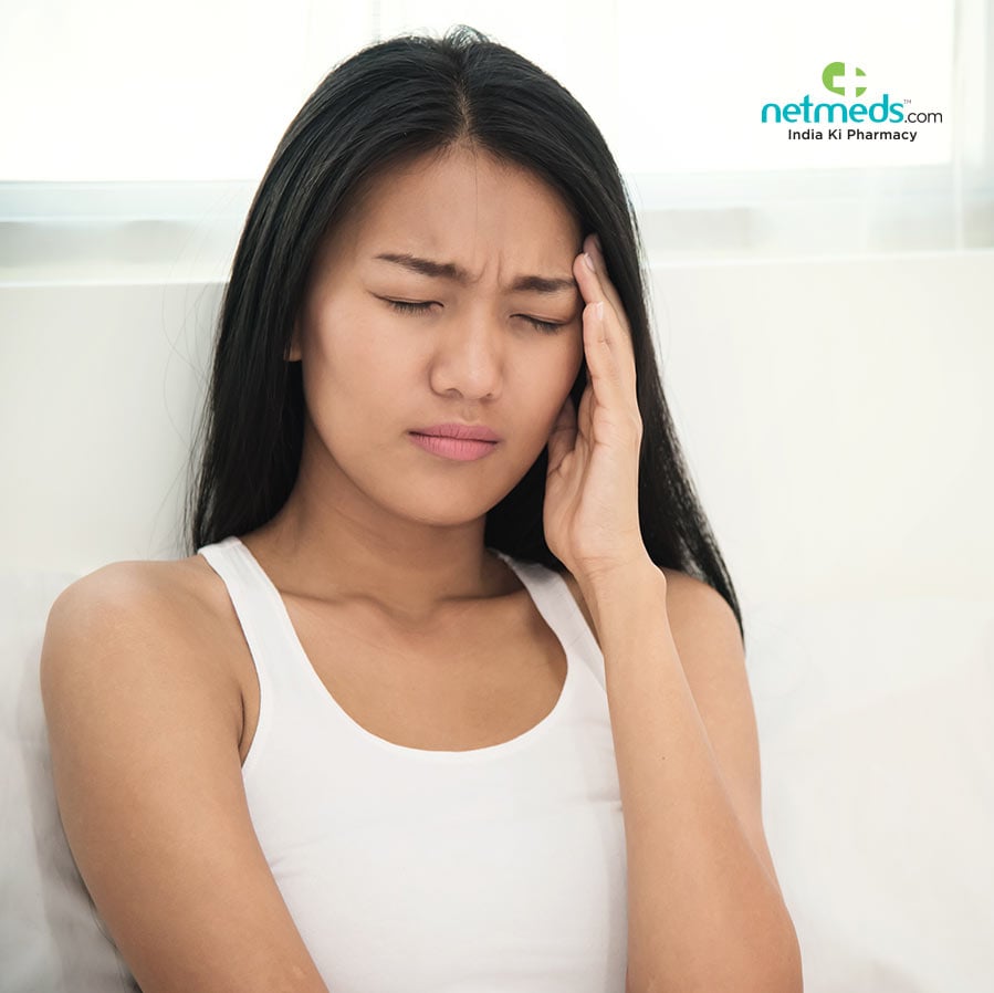 A girl suffering from migraine