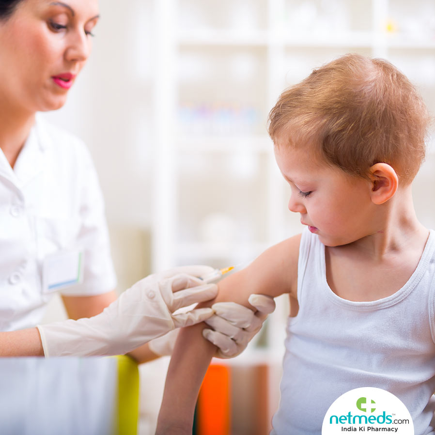 Doctor Giving Vaccination To A Child