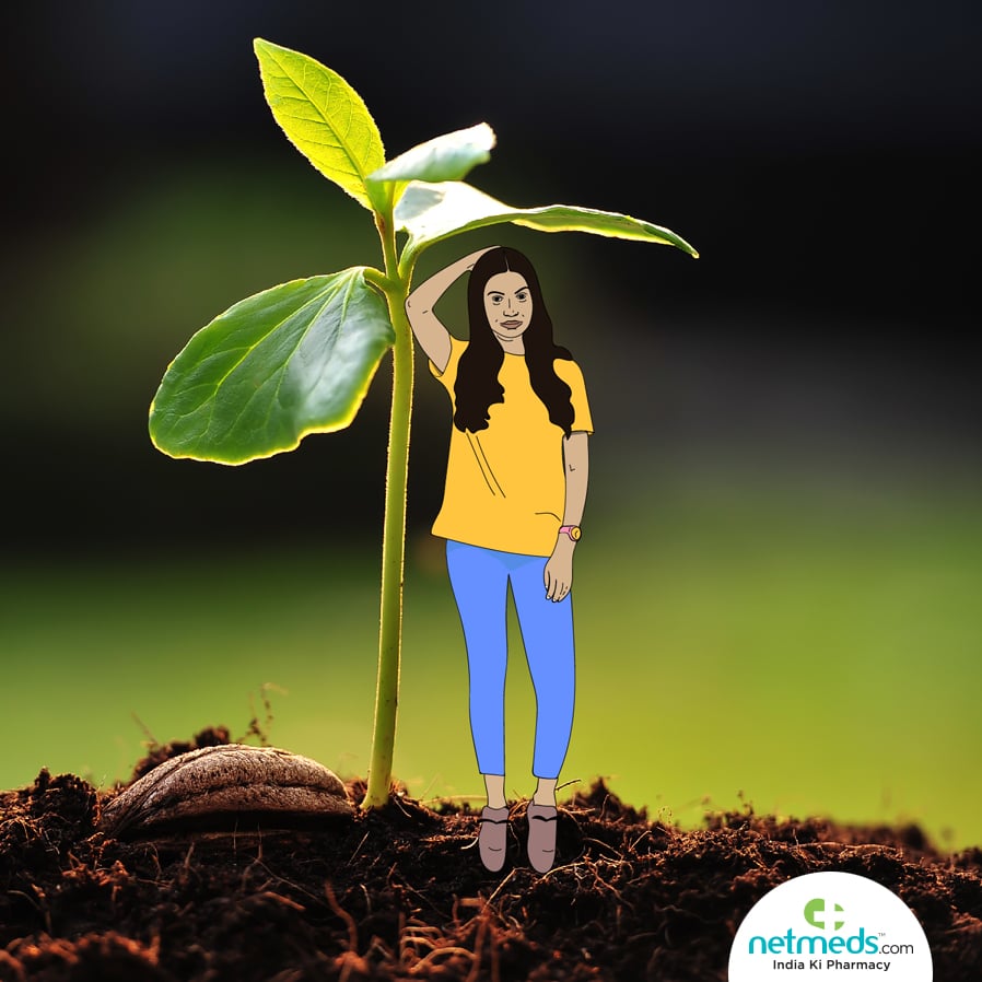 small plant and girl