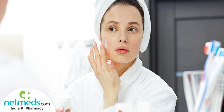 Woman applying cream