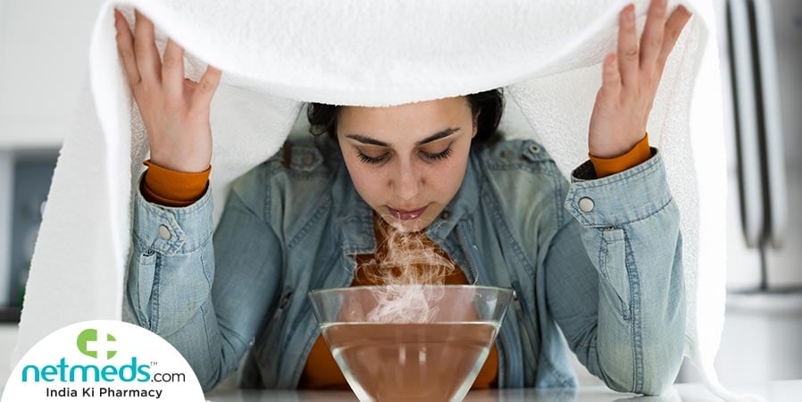 Woman taking steam inhalation