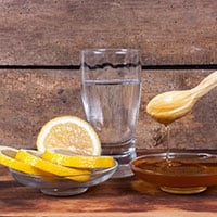 6 Reasons Why You Should Drink Lemon And Honey Water