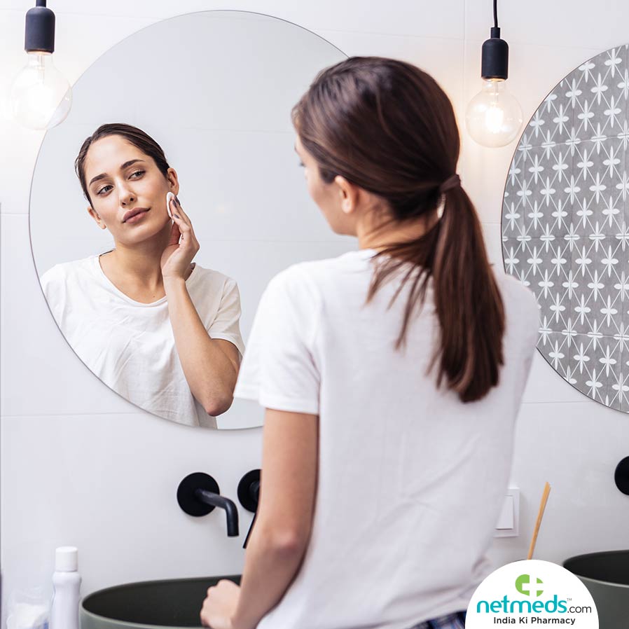 Woman applying toner