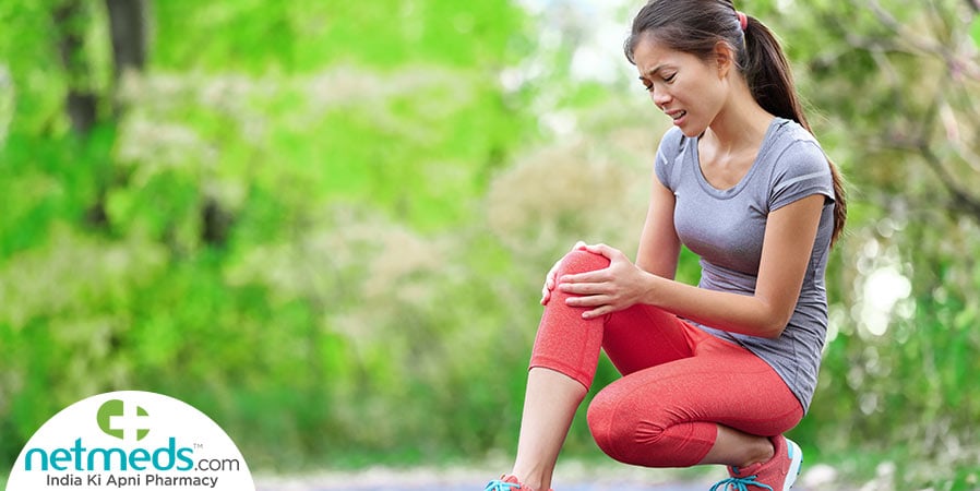 Woman suffering from pulled quad