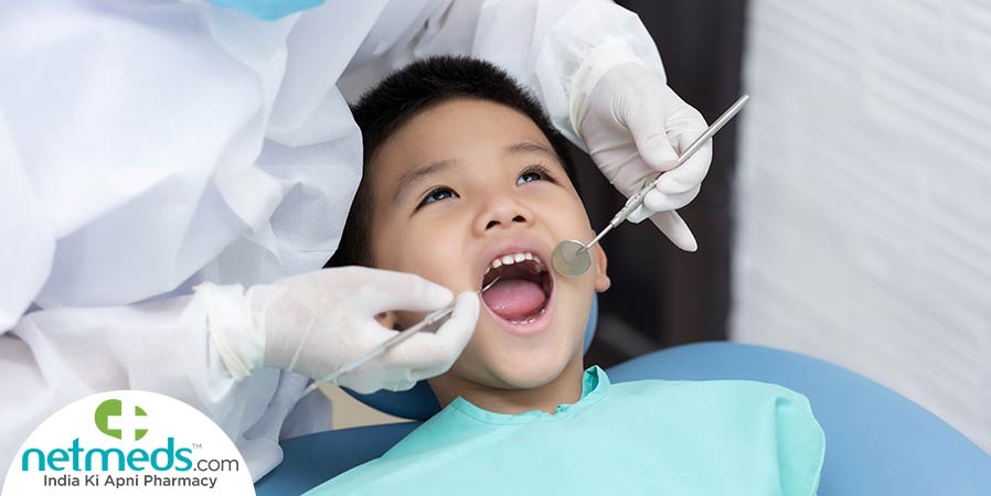 Doctor doing cavity filling for a boy