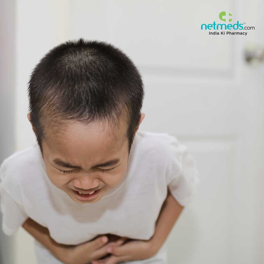 A boy suffering from stomach pain