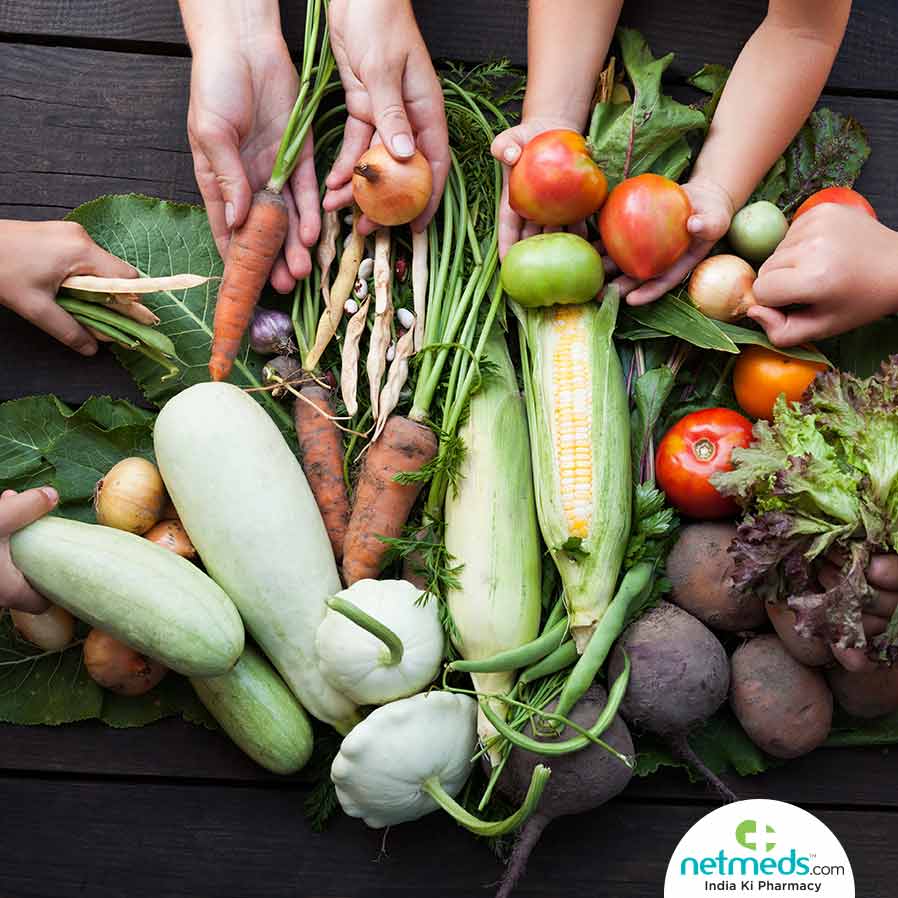 Hands touching the vegetables