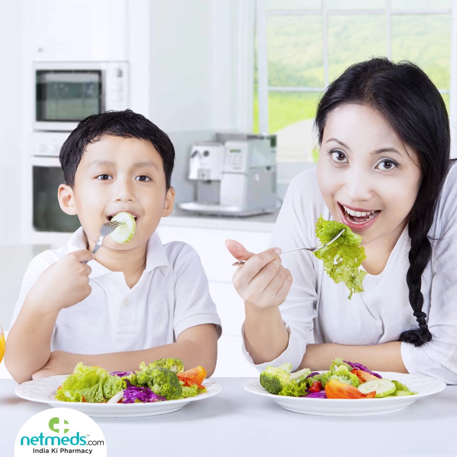 Mother and child eating healthy food