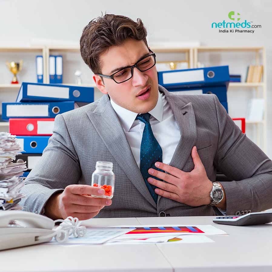 Man With Acid Reflux Having medicine in one hand