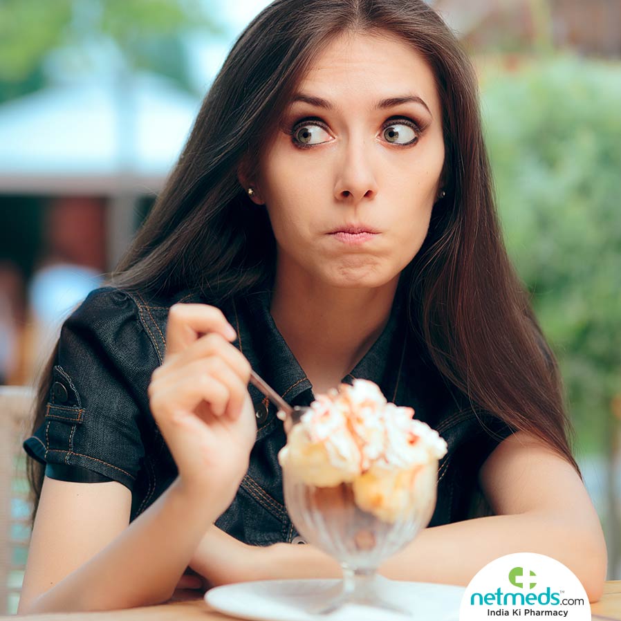 Woman eating ice-cream