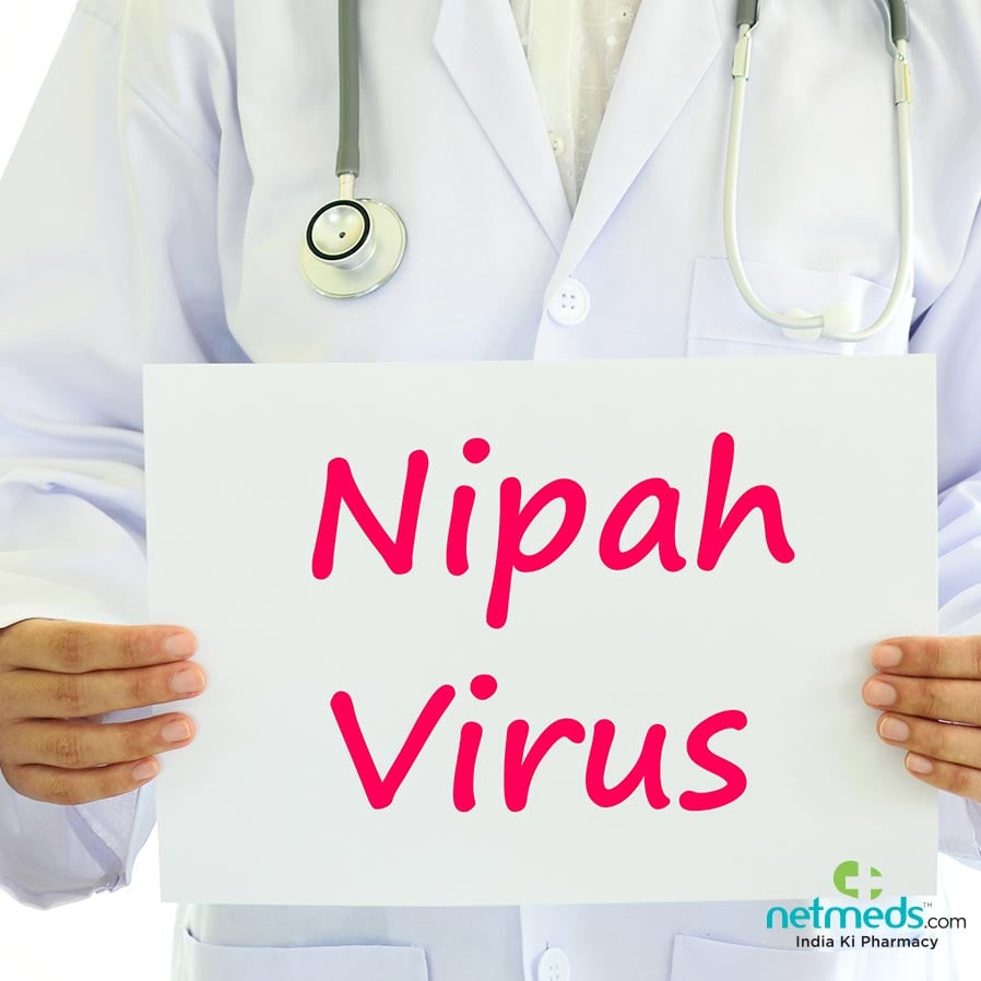 Doctor holding nipah virus board