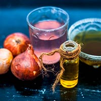 5 Astonishing Benefits Of Red Onion Hair Oil For Lustrous And Stronger Mane