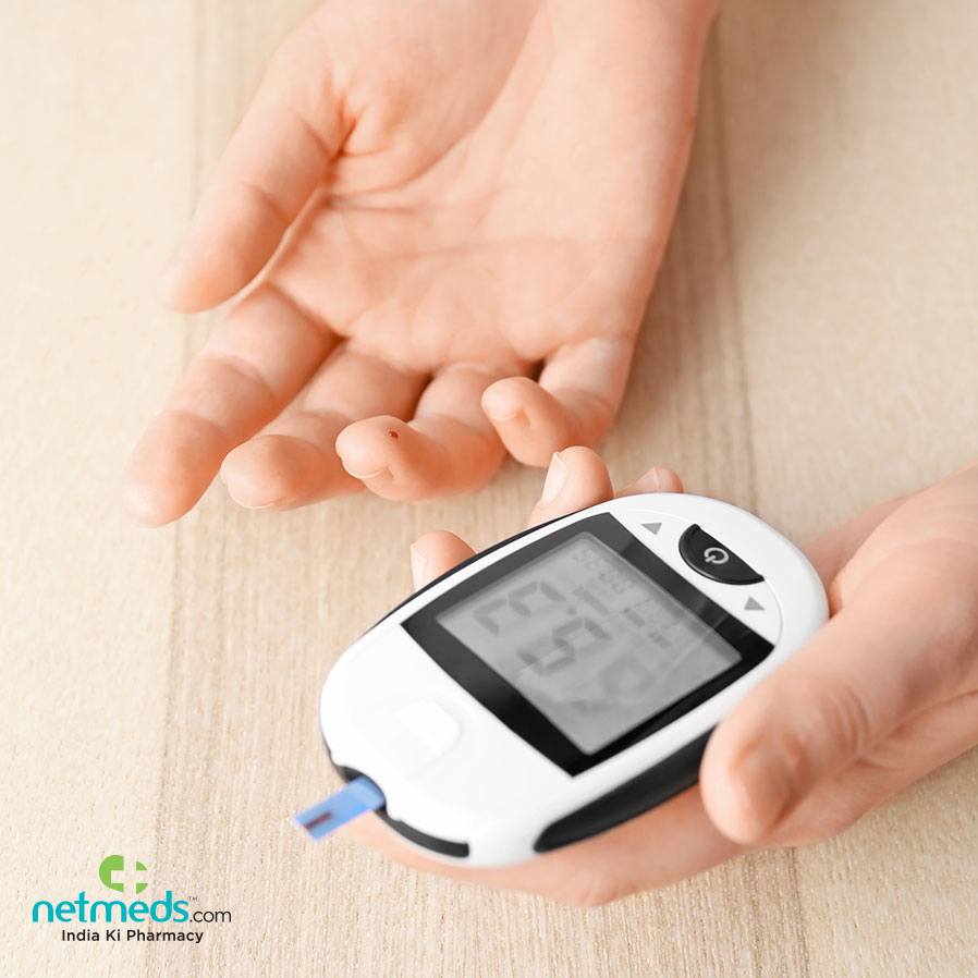 checking sugar level with glucometer