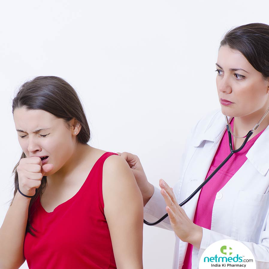 Girl coughing while doctor is testing