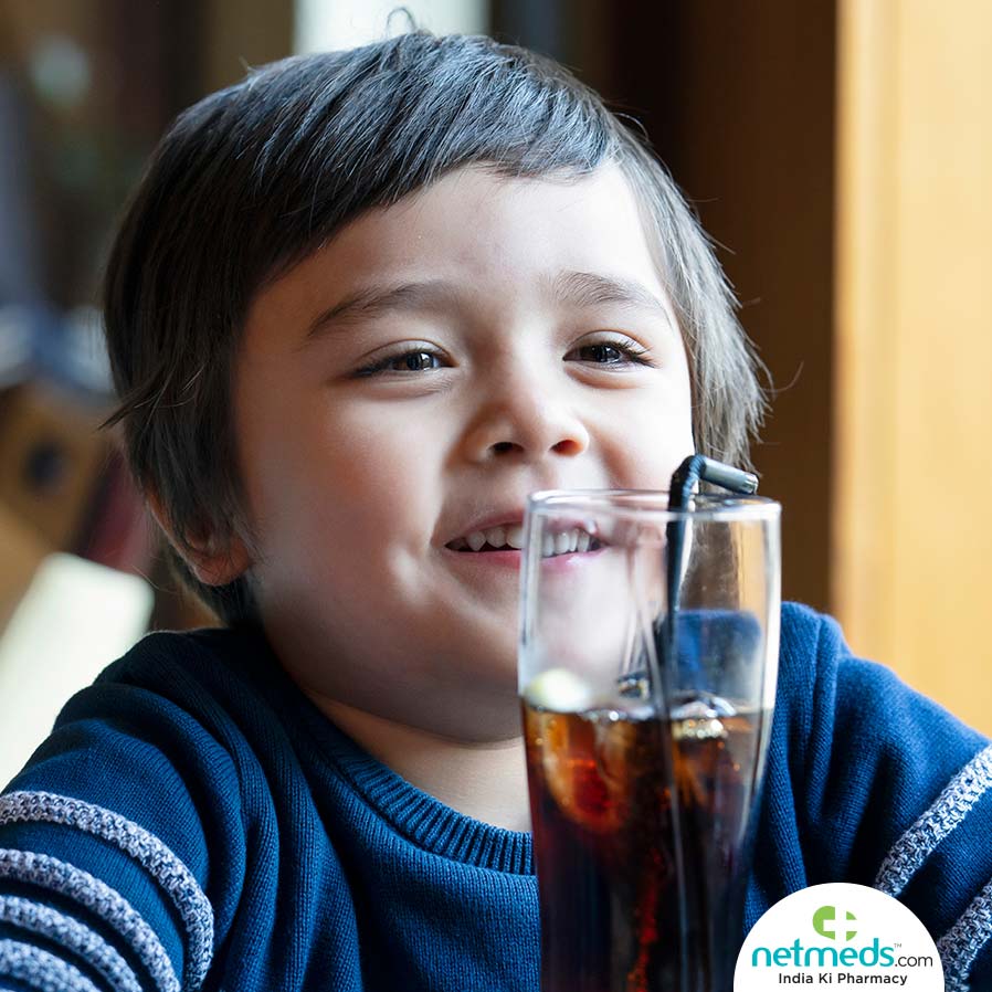 Kid drinking diet soda