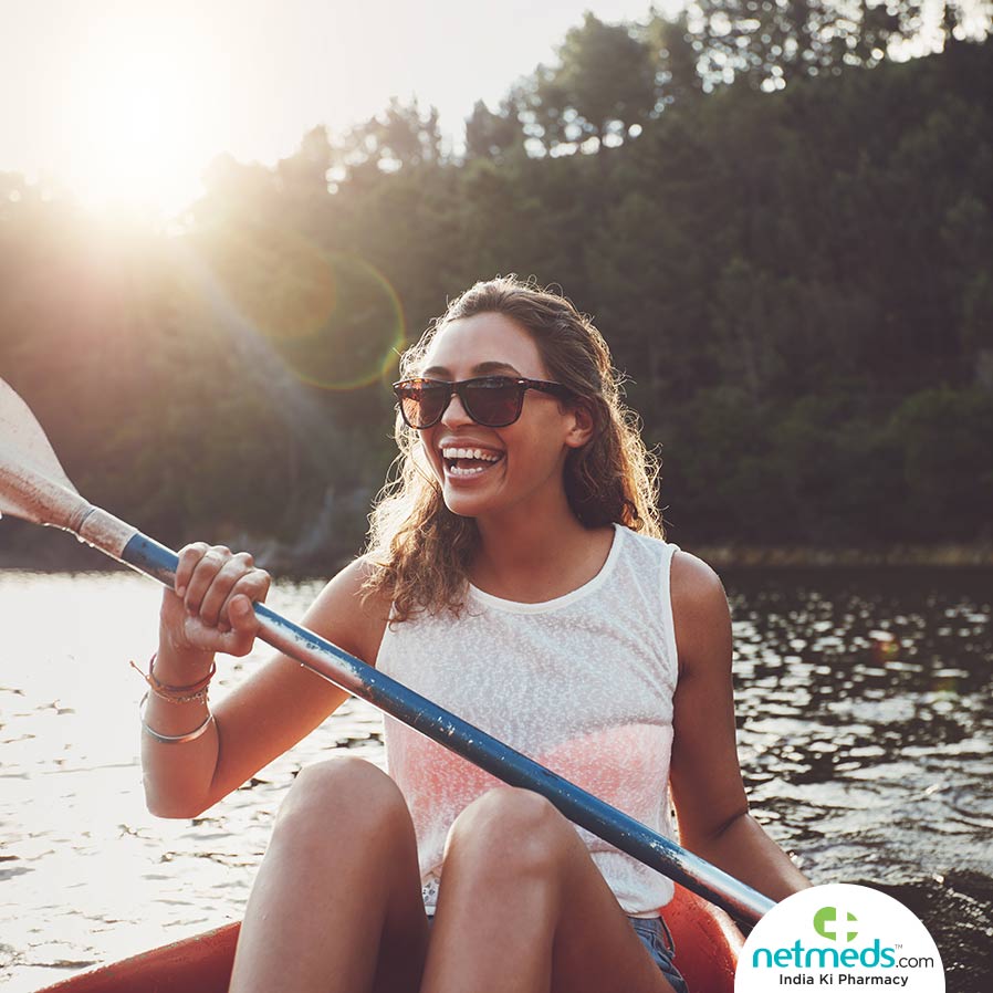 Woman rowing a boat on a vacay