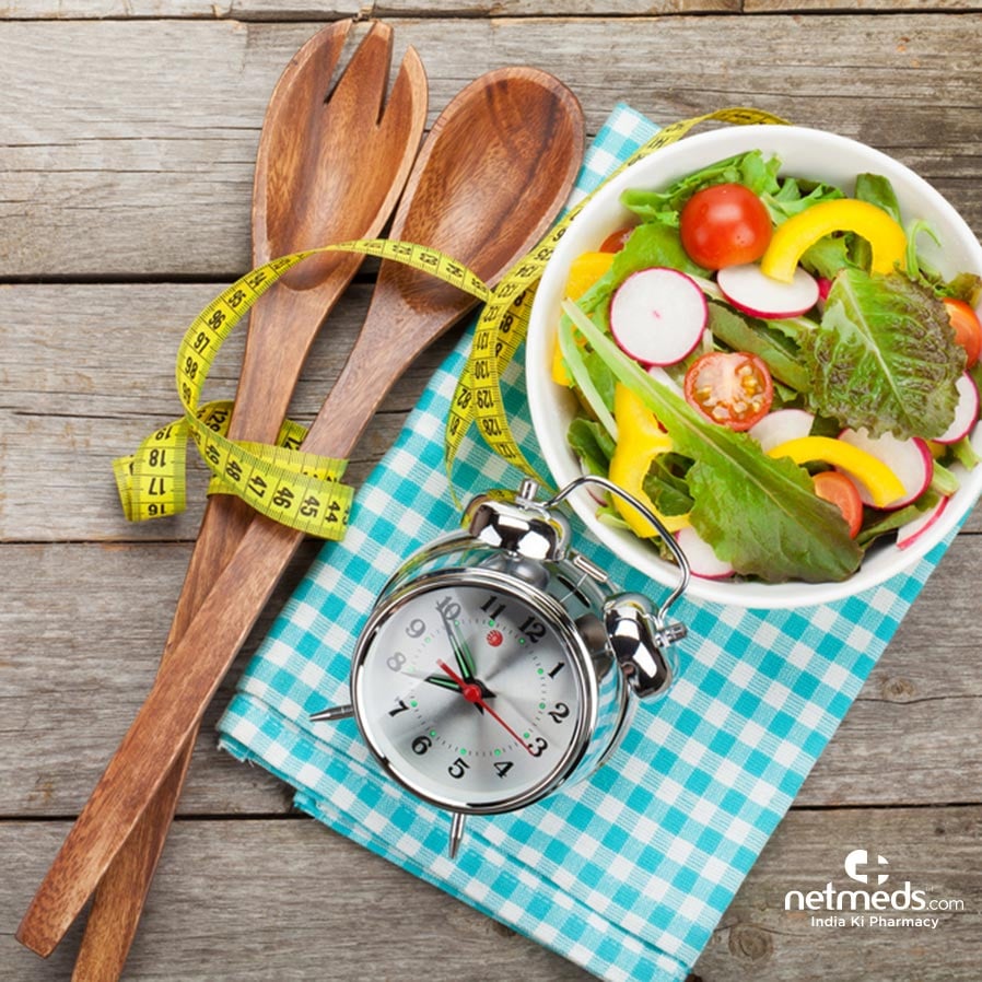 Vegetables, alarm and measuring tape
