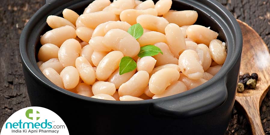 Cooked navy beans in a bowl